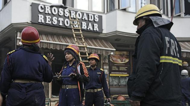 Firefighters seen outside Hotel Arpit Palace after a massive fire broke out at the hotel, at Karol Bagh, New Delhi, on Tuesday, February 12, 2019. (Sanchit Khanna/HT Photo) Firefighters seen outside Hotel Arpit Palace after a massive fire broke out at the hotel, at Karol Bagh, New Delhi, on Tuesday, February 12, 2019. (Sanchit Khanna/HT Photo)
