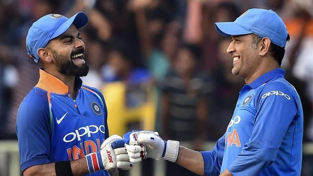 File image of Virat Kohli (L) with MS Dhoni. (PTI) File image of Virat Kohli (L) with MS Dhoni. (PTI)