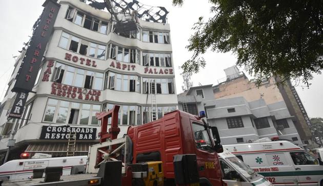 Ambulances and fire tender seen outside the Hotel Arpit Palace after a massive fire broke out there, Karol Bagh in New Delhi, on Tuesday, February 12, 2019.(Biplov Bhuyan/HT PHOTO)