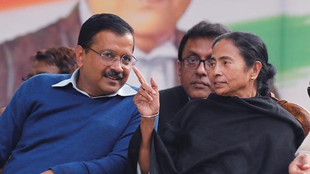 Chief Minister of Delhi, Arvind Kejriwal, talks with Chief Minister of West Bengal, Mamata Banerjee, during the "Save Democracy" rally to protest against ruling Bharatiya Janata Party (BJP) government in New Delhi. (REUTERS) Chief Minister of Delhi, Arvind Kejriwal, talks with Chief Minister of West Bengal, Mamata Banerjee, during the "Save Democracy" rally to protest against ruling Bharatiya Janata Party (BJP) government in New Delhi. (REUTERS)