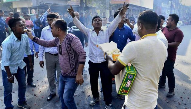 Activists of Assam Jatiya Yuba Chatra Parishad (AJYCP) distribute sweet items and burst fire-crackers as they celebrate in Guwahati after the Citizenship (Amendment) Bill could not be tabled in the Rajya Sabha on Wednesday. (PTI) Activists of Assam Jatiya Yuba Chatra Parishad (AJYCP) distribute sweet items and burst fire-crackers as they celebrate in Guwahati after the Citizenship (Amendment) Bill could not be tabled in the Rajya Sabha on Wednesday. (PTI)