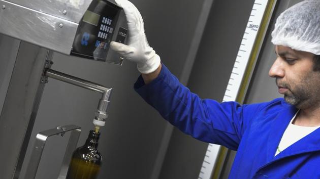 Jaime Grimaldo bottles olive oil at a factory in Oliete. Spain’s high commissioner for the fight against depopulation, Isaura Leal, told AFP that Oliete was proof that “generations of youths are starting to see an opportunity” in living in the countryside. “It’s no longer seen as something for failures, for bumpkins, as our parents used to say,” she added. (Jose Jordan / AFP)