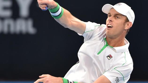 Sam Querrey of the US hits a return to Gilles Simon of France.(AFP)