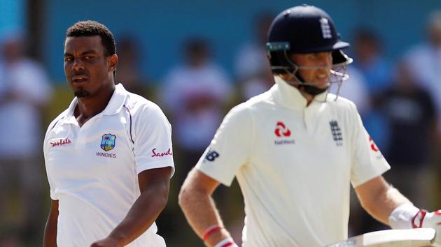 West Indies' Shannon Gabriel with England's Joe Root.(Action Images via Reuters)