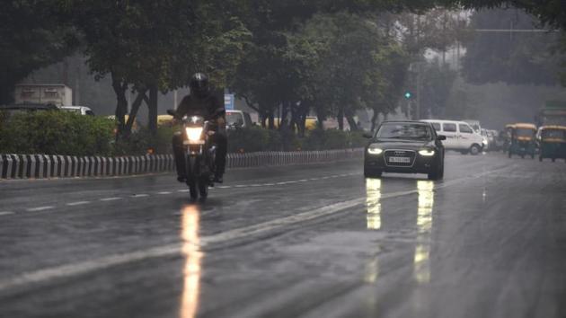 Rains lashed the capital in the morning on February 14. (HT Photo/Amal KS) Rains lashed the capital in the morning on February 14. (HT Photo/Amal KS)