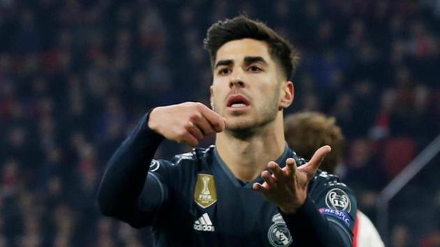 Real Madrid's Marco Asensio celebrates scoring their second goal against Ajax.(Reuters)