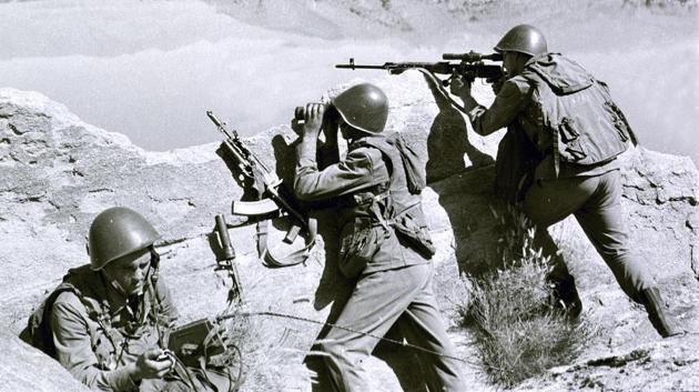 Soviet soldiers observe the highlands in 1988. “The tragedy of Afghanistan was one of many other tragedies caused by the Soviet breakup,” Nikita Mendkovich, a Moscow-based expert on Afghanistan said. Mendkovich emphasized the changing public perception of the war, saying that it’s now widely seen as “painful, but necessary and even inevitable.” (Alexander Sekretarev / AP File)