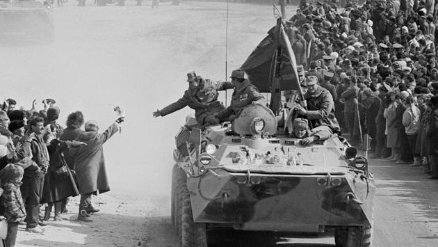 People greet Soviet Army soldiers in then Soviet Uzbekistan. In Russia, many veterans blame Gorbachev for a hasty pullout that squandered the hard-fought gains, and they hold Russia’s first president, Boris Yeltsin, responsible for the demise of Najibullah. “And in the end we just gave up everything and also ruined the Soviet Union,” said Frants Klintsevich, a veteran who serves as a lawmaker in Russia’s upper house. (Alexander Zemlianichenko / AP File)