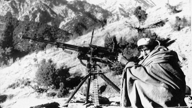 An Afghan rebel gets ready to fire at position on January 1, 1988. Ata Mohammad Noor, a former warlord and governor of the northern Balkh province, attended a meeting last week in Moscow that brought together former Afghan officials, opposition figures and the Taliban. “I don’t think that Russia would like to repeat what it did in the past. It’s totally different today,” Noor said to The Associated Press. (David Stewart-Smith / AP File)