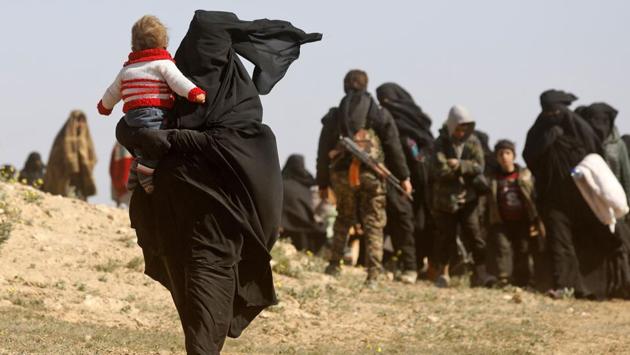 In the nearby health clinic, veiled women lay their haggard toddlers on a table for a doctor with worn-out eyes to examine. A 19-year-old with an infant on her hip emerged from the women’s clinic. “I just found out I’m pregnant.” (Delil Souleiman / AFP) In the nearby health clinic, veiled women lay their haggard toddlers on a table for a doctor with worn-out eyes to examine. A 19-year-old with an infant on her hip emerged from the women’s clinic. “I just found out I’m pregnant.” (Delil Souleiman / AFP)