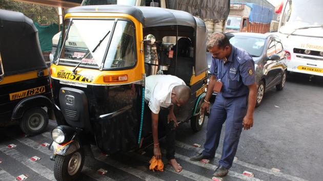 A cleanliness crusader since 2010, Nikam, who is one of the 200 clean-up marshals appointed by the Thane Municipal Corporation (TMC), is now no less than a celebrity after a commuter shot a video of him compelling an auto driver to clean up his spit. (PRAFUL GANGURDE) A cleanliness crusader since 2010, Nikam, who is one of the 200 clean-up marshals appointed by the Thane Municipal Corporation (TMC), is now no less than a celebrity after a commuter shot a video of him compelling an auto driver to clean up his spit. (PRAFUL GANGURDE)