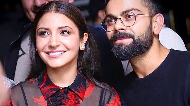 Anushka Sharma opted for a sleek, non-cheesy, black and red blouse and trousers look, instead of wearing all-red or pink. (Instagram)