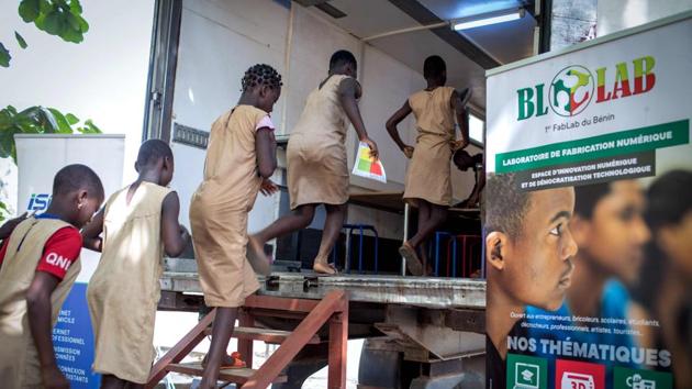 The lorry is loaded with computers -- the kind of technology that few students in the West African country had ever seen, much less touched. Benin’s internet penetration rate is just 42.2 percent, the Regulatory Authority for Electronic and Postal Communication said in a report last year. Among these, almost everyone (96 percent) used a mobile phone for accessing the web. These are the conditions which spawned the idea for a mobile classroom furnished with desks as well as fans to ward off the tropical heat. (Yanick Folly / AFP) The lorry is loaded with computers -- the kind of technology that few students in the West African country had ever seen, much less touched. Benin’s internet penetration rate is just 42.2 percent, the Regulatory Authority for Electronic and Postal Communication said in a report last year. Among these, almost everyone (96 percent) used a mobile phone for accessing the web. These are the conditions which spawned the idea for a mobile classroom furnished with desks as well as fans to ward off the tropical heat. (Yanick Folly / AFP)