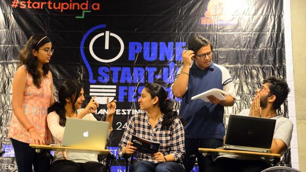 (From left) Srishti, Jagruti, Rasika, Lavdeep and Shabir are busy planning for the Pune Startup Fest on Tuesday. The five COEP students have decided to volunteer for the event.(SHANKAR NARAYAN/ HT PHOTO)