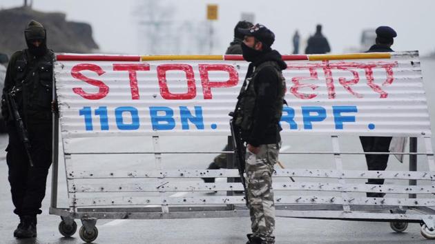 Indian security forces stand guard on a road block along the Srinagar-Jammu Highway following an attack on a paramilitary Central Reserve Police Force (CRPF) convoy on February 14, 2019.(AFP file photo)