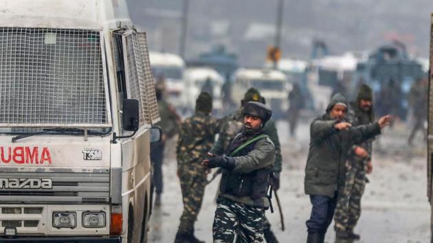 Lathepora: Army soldiers at the site of suicide bomb attack at Lathepora Awantipora in Pulwama district of south Kashmir, Thursday, February 14, 2019. At least 30 CRPF jawans were killed and dozens other injured when a CRPF convoy was attacked.(PTI)