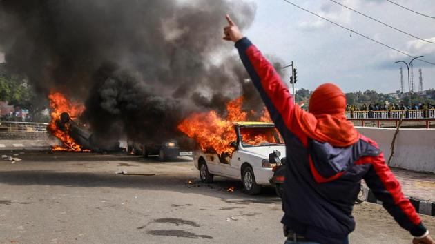 Vehicles set on fire by protestors against the killing of 38 Central Reserve Police Force (CRPF) personnel in the Pulwama terror attack, in Jammu. “Three youth were injured in the stone pelting and then the protesters went berserk and damaged around 15 to 20 vehicles. Later, some people from a particular community pelted stones at MES headquarters but the police parties reached in time and again fired teargas shells to disperse them,” said a police source. (PTI)