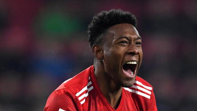 Bayern Munich's David Alaba celebrates scoring their third goal against Augsburg. (Reuters) Bayern Munich's David Alaba celebrates scoring their third goal against Augsburg. (Reuters)