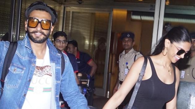 Newlyweds Ranveer Singh and Deepika Padukone seen at Mumbai's airport.(IANS)