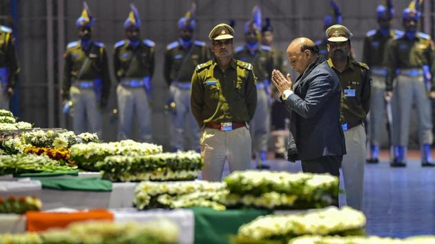Union Home Minister Rajnath Singh pays tribute to the martyred CRPF jawans, who lost their lives in Thursday's Pulwama terror attack, after their mortal remains were brought at AFS Palam in New Delhi, Feb 15. (PTI) Union Home Minister Rajnath Singh pays tribute to the martyred CRPF jawans, who lost their lives in Thursday's Pulwama terror attack, after their mortal remains were brought at AFS Palam in New Delhi, Feb 15. (PTI)
