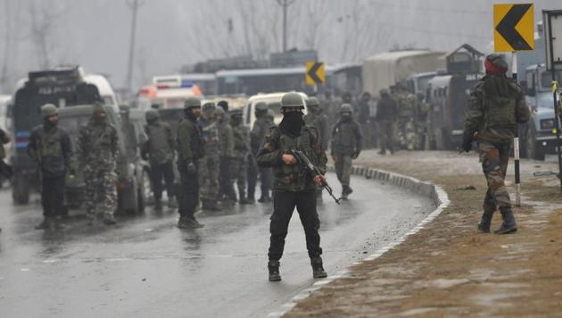 On Thursday, 40 CRPF jawans, including five from Rajasthan, were killed when a Jaish-e-Mohammad (JeM) suicide bomber rammed a car laden with an estimated 100 kg explosives in a CRPF bus in Awantipora of Jammu and Kashmir’s Pulwama district.(HT Photo)