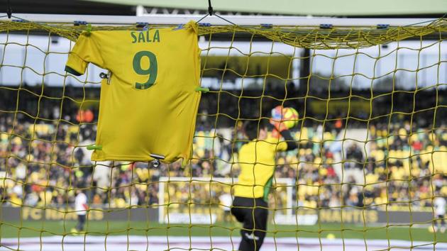 A jersey is displayed on the goal in memory of late Argentinian forward Emiliano Sala.(AFP)