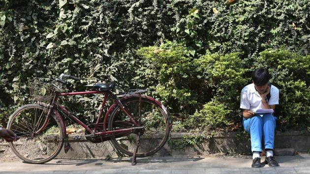 A student revises ahead of the first day of class X West Bengal board exams at Jodhpur Boys High School, in Kolkata, West Bengal. (Arijit Sen / HT Photo)