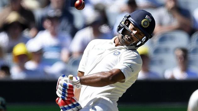India's Mayank Agarwal avoids a bouncer during play on day one of the third Test against Australia.(AP)