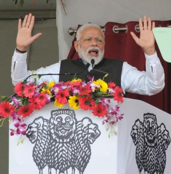 At a public meeting in north Bihar’s Barauni, Narendra Modi condoled the families of CRPF personnel Sanjay Kumar Sinha and Ratan Kumar Thakur, who were among the 40 troopers killed after a suicide bomber in a car targeted their convoy on February 14.(AP Dube/HT Photo)