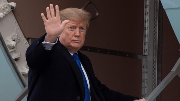 US President Donald Trump waves as he boards Air Force One at Andrews Air Force Base, MD, on February 15, 2019. - Trump is spending the weekend at his Mar-a-Lago estate in Palm Beach, Florida. (AFP) US President Donald Trump waves as he boards Air Force One at Andrews Air Force Base, MD, on February 15, 2019. - Trump is spending the weekend at his Mar-a-Lago estate in Palm Beach, Florida. (AFP)