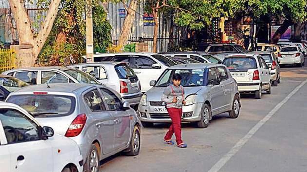 All vehicles were parked on roadsides, be it those with stickers or of visitors, were parked on roadsides, instead of inside demarcated spaces in Lajpat Nagar II on Sunday, Feb 17, 2019.(HT Photo) All vehicles were parked on roadsides, be it those with stickers or of visitors, were parked on roadsides, instead of inside demarcated spaces in Lajpat Nagar II on Sunday, Feb 17, 2019.(HT Photo)
