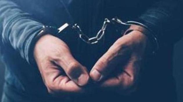 Arrested computer hacker and cyber criminal with handcuffs, close up of hands (Getty Images/iStockphoto) Arrested computer hacker and cyber criminal with handcuffs, close up of hands (Getty Images/iStockphoto)