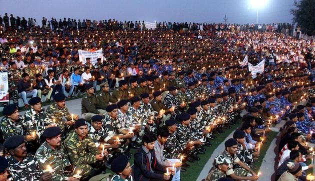Central Security Forces personnel in Bhopal lit candles to pay tribute to the jawans killed in Pulwama terror attack, February 16. A telling response is required, particularly now when the forces behind Pulwama attack are gaining strength in our neighbourhood(ANI)