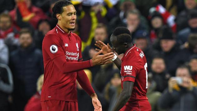 Sadio Mane (R) celebrates with Liverpool's Dutch defender Virgil van Dijk (L). (AFP) Sadio Mane (R) celebrates with Liverpool's Dutch defender Virgil van Dijk (L). (AFP)