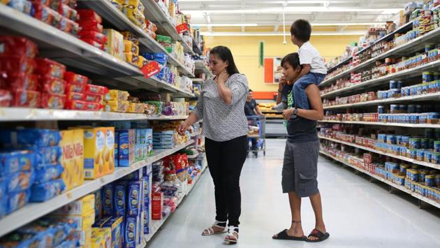 They are adjusting to life in the United States - shopping at Walmart, learning to drive, adopting a dog. Carolina has become good friends with her Honduran neighbours, Jefferson and Sulmy. But the children are unable to go to school without proof of identity, Orfa said. Finding food for them when she was not allowed to work was challenging. (Loren Elliott / REUTERS)