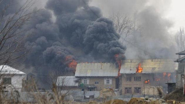 A top Jaish-e-Mohammed (JeM) commender, suspected to be the bomb maker and mastermind of Pulwama attack on a CRPF convoy, was among two terrorists killed in an encounter with security forces in the same district’s Pingilana village, Jammu and Kashmir. In the ensuing 11-hour gunbattle, four army personnel, including a major, and a civilian were killed. (Waseem Andrabi / HT Photo)