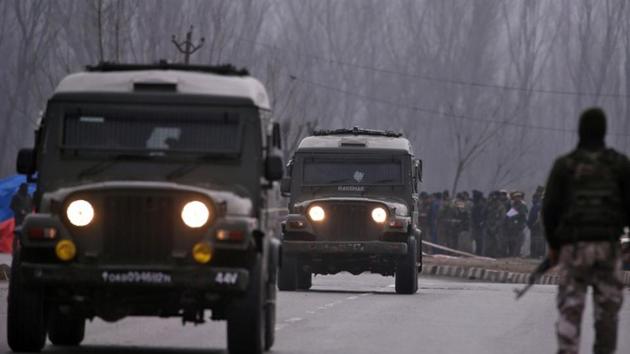 Security personnel stand guard near the site of Thursday's suicide bomb attack in Lethpora in south Kashmir's Pulwama district February 15, 2019. (Reuters File) Security personnel stand guard near the site of Thursday's suicide bomb attack in Lethpora in south Kashmir's Pulwama district February 15, 2019. (Reuters File)