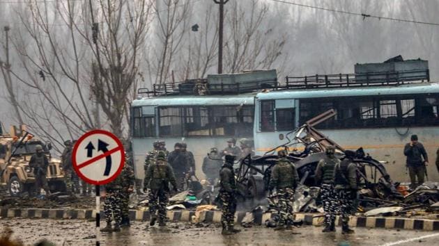 Security personnel carry out the rescue and relief works at the site of suicide bomb attack at Lathepora Awantipora in Pulwama district of south Kashmir on February 14. (PTI Photo) Security personnel carry out the rescue and relief works at the site of suicide bomb attack at Lathepora Awantipora in Pulwama district of south Kashmir on February 14. (PTI Photo)