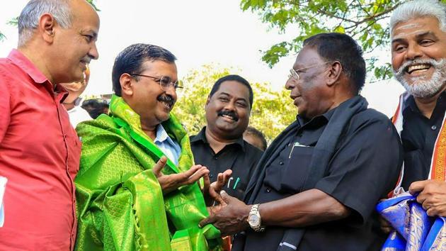 Puducherry Chief Minister V Narayanasamy welcomes Delhi Chief Minister Arvind Kejriwal as he arrives to support his dharna outside the official residence of Lt Governor Kiran Bedi for not permitting implementation of his government's welfare schemes, in Puducherry on Monday. (PTI) Puducherry Chief Minister V Narayanasamy welcomes Delhi Chief Minister Arvind Kejriwal as he arrives to support his dharna outside the official residence of Lt Governor Kiran Bedi for not permitting implementation of his government's welfare schemes, in Puducherry on Monday. (PTI)