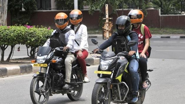 The taxi typically carries one passenger, who rides as the pillion behind the motorcycle operator. (HT File) The taxi typically carries one passenger, who rides as the pillion behind the motorcycle operator. (HT File)