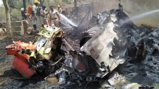 The debris of one of the two Surya Kiran planes that crashed at Yelahanka air base in Bengaluru today. The debris of one of the two Surya Kiran planes that crashed at Yelahanka air base in Bengaluru today.