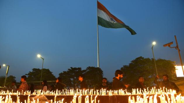 People attend a candle light vigil organised by NDMC to pay tribute to CRPF personnel who were killed in the Pulwama terror attack, New Delhi, India, on Sunday, February 17(Arvind Yadav/HT PHOTO) People attend a candle light vigil organised by NDMC to pay tribute to CRPF personnel who were killed in the Pulwama terror attack, New Delhi, India, on Sunday, February 17(Arvind Yadav/HT PHOTO)