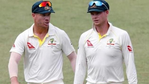 Australia's David Warner and Steve Smith leave the pitch after beating South Africa.(REUTERS)