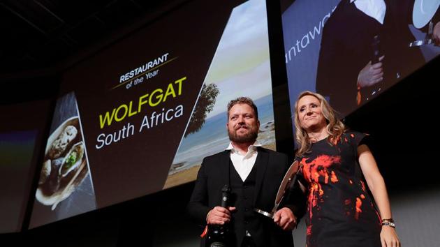 Chef Kobus van der Merwe (L) receives the Restaurant of the year award for his restaurant Wolfgat in South Africa during the inaugural World Restaurant Awards. (AFP) Chef Kobus van der Merwe (L) receives the Restaurant of the year award for his restaurant Wolfgat in South Africa during the inaugural World Restaurant Awards. (AFP)