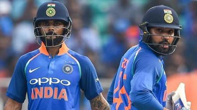 Virat Kohli and batsman Rohit Sharma run between the wickets during the 5th and final ODI cricket match against West Indies.(PTI)