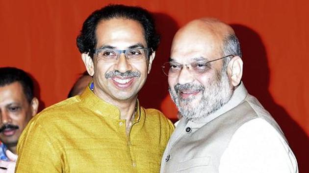 Shiv Sena president Uddhav Thackeray and BJP national president Amit Shah Greet each other and Maharastra Chief minister Devendra Fadnavis during a press conference of Shiv Sena and BJP to announce alliance for upcoming 2019 elections at Worli on Monday in Mumbai, India, on Monday, February 18, 2019.(Vijayanand Gupta/HT Photo)
