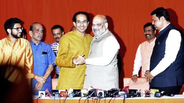 After questions were raised over its decision to revive the alliance with the BJP, Shiv Sena on Wednesday clarified why it did a U-turn on its decision to go solo in elections. The Sena said that it is not “helpless” and no “adjustment” was reached for power and that it gave “another chance” to the alliance after differences were sorted between the two parties. (Vijayanand Gupta / HT File) After questions were raised over its decision to revive the alliance with the BJP, Shiv Sena on Wednesday clarified why it did a U-turn on its decision to go solo in elections. The Sena said that it is not “helpless” and no “adjustment” was reached for power and that it gave “another chance” to the alliance after differences were sorted between the two parties. (Vijayanand Gupta / HT File)