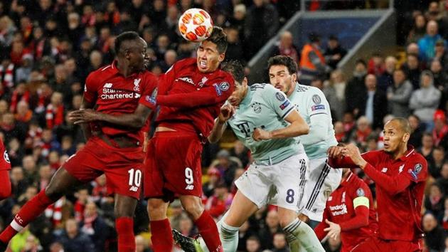 Liverpool's Sadio Mane, Roberto Firmino and Fabinho in action with Bayern Munich's Javi Martinez and Mats Hummels during their Champions League encounter on Tuesday.(REUTERS)