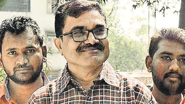 Dalit scholar Anand Teltumbade appeared for questioning at the Swargate police station on Tuesday. (Photo by Ravindra Joshi/HT PHOTO) Dalit scholar Anand Teltumbade appeared for questioning at the Swargate police station on Tuesday. (Photo by Ravindra Joshi/HT PHOTO)