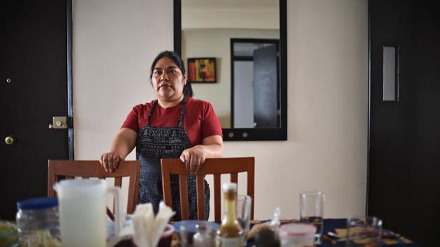Mexican domestic worker Ignacia Ponciano poses at the house where she has worked for over 30 years in Mexico City on January 18, 2019. - The working conditions of domestics in Latin America, to whom director Alfonso Cuaron pays homage in his recent movie 'Roma', is slowly reaching a legal framework. Whilst several countries in the region have established laws for the sector in the last decade, other simultaneous realities such as economic crises and migration, are hampering those conquests and ambitions of formality. (Photo by Rodrigo ARANGUA / AFP)(AFP)